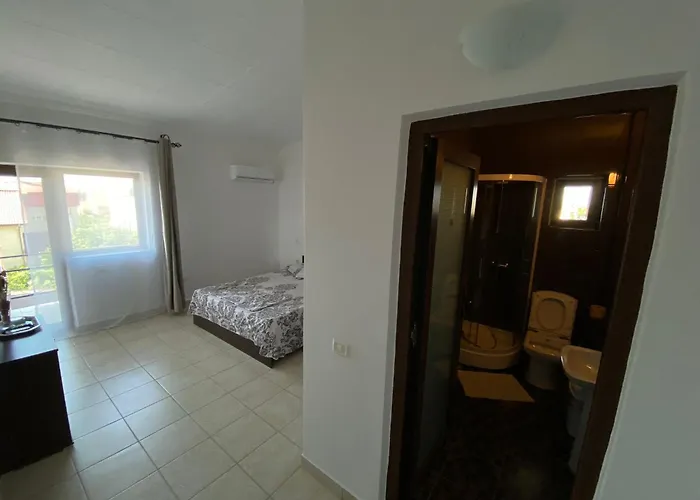 Gazde/Camere de închiriat Casa Evy